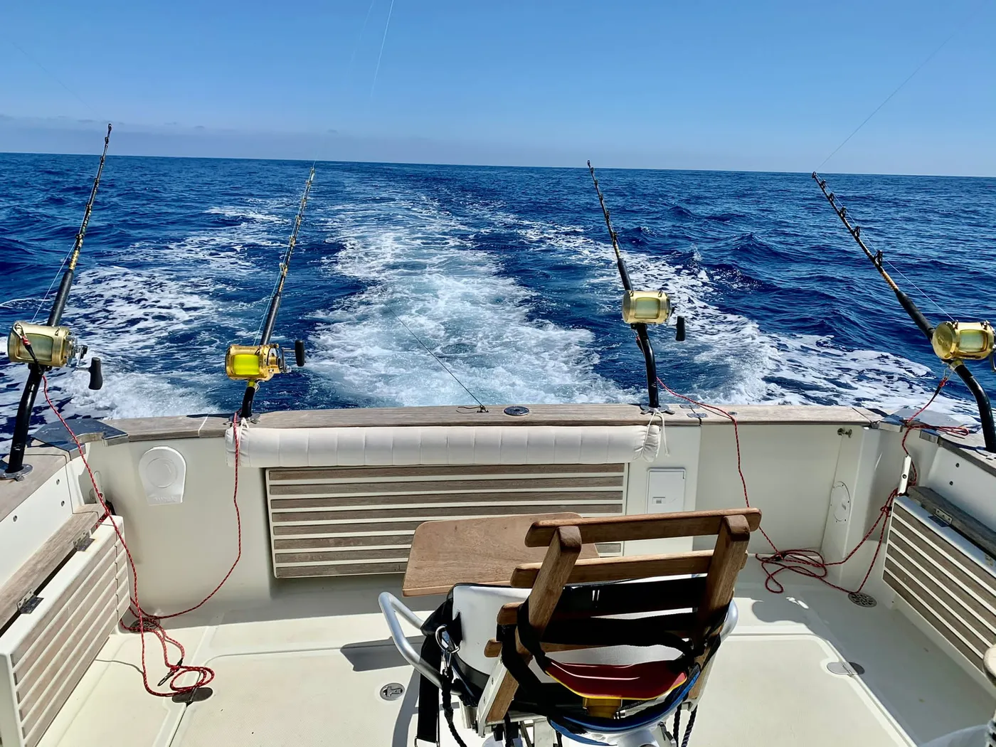 Trolling the deep water off South Tenerife Trolling spread set from the stern of Mikestrike during an offshore charter off Tenerife