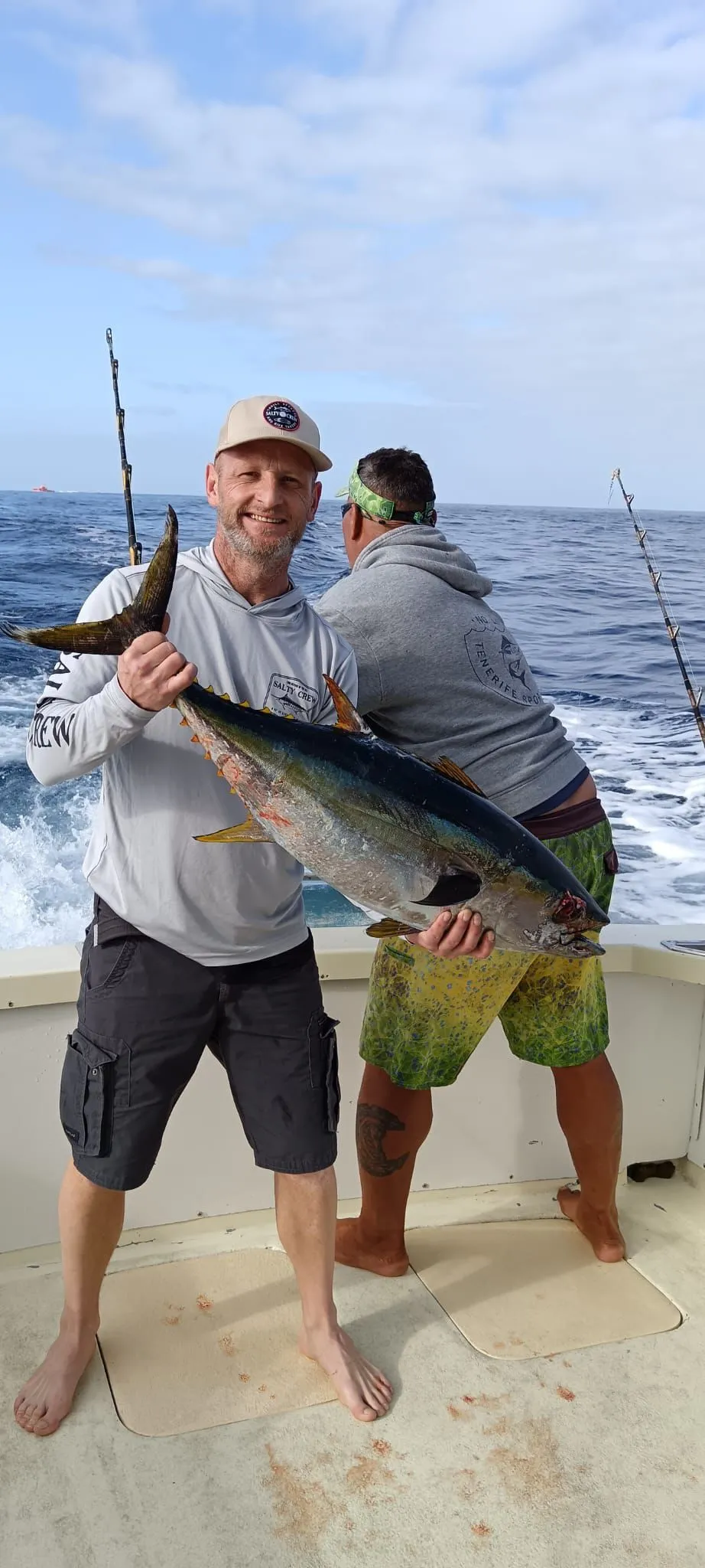 Yellowfin tuna off South Tenerife Two anglers with a yellowfin tuna aboard No Limits One off Tenerife