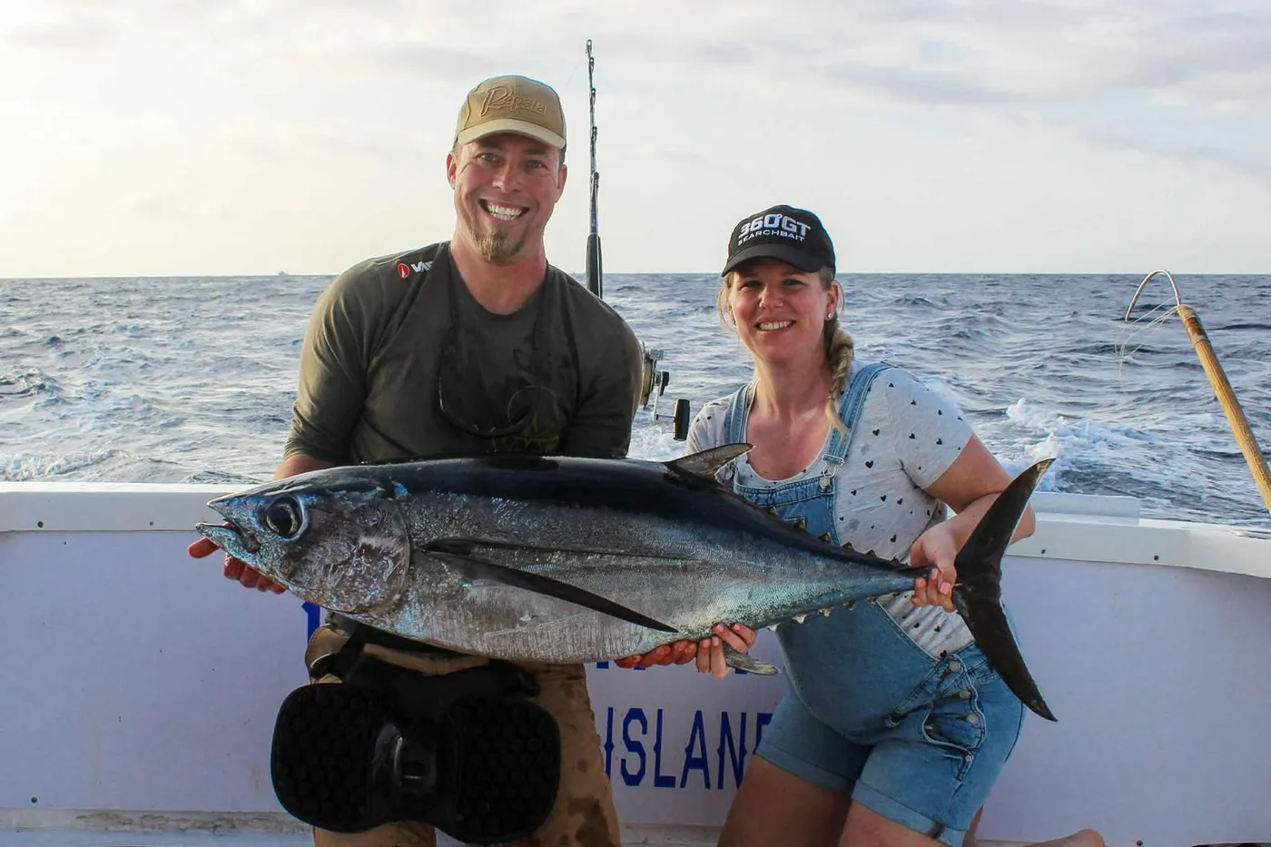 Yellowfin tuna off South Tenerife A couple with a yellowfin tuna caught aboard No Limits One off Tenerife