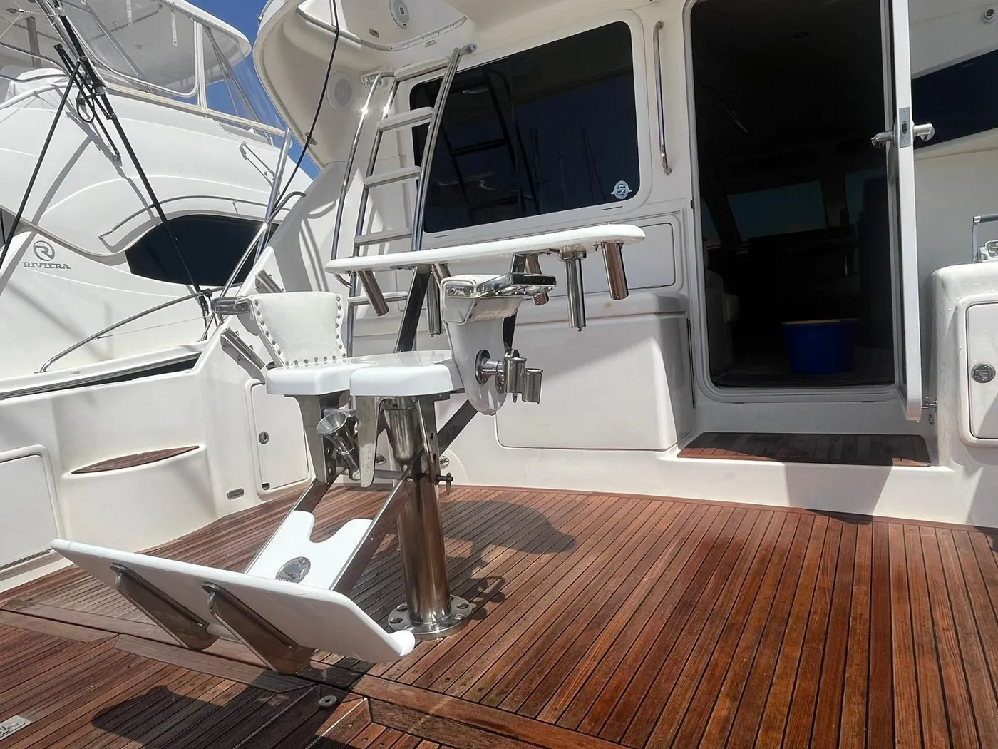 The Tanoa's fighting chair and teak cockpit The stainless fighting chair and teak cockpit of the Tanoa sportfishing yacht, Tenerife